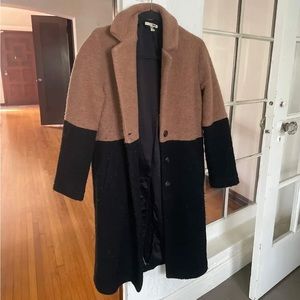 Black and tan coat